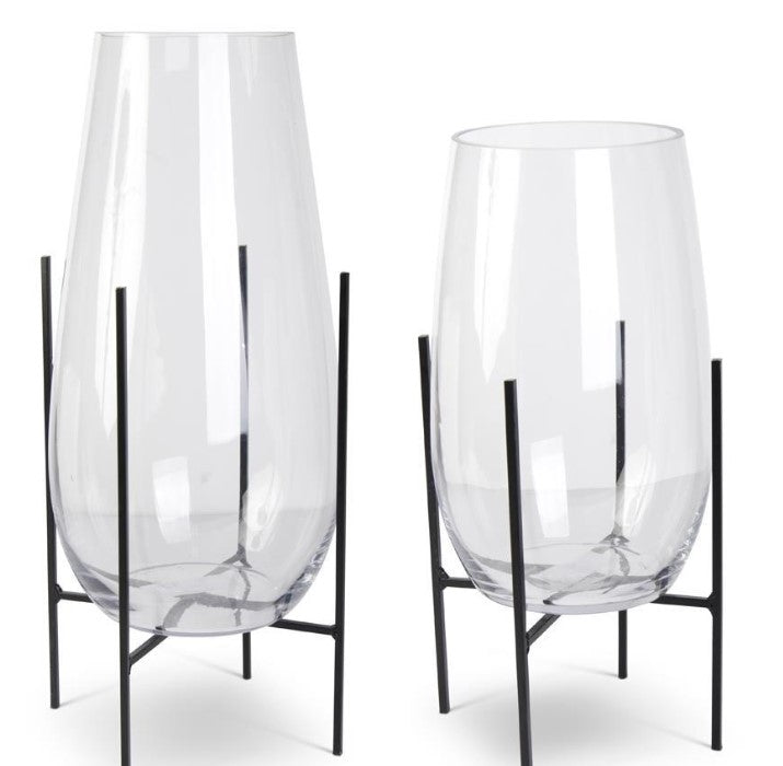 Clear Glass Floating on Dark Metal Stands