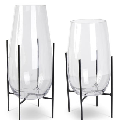 Clear Glass Floating on Dark Metal Stands